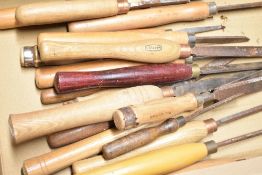 A collection of wood turning chisels of various makes
