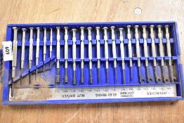 A boxed 21 piece set of precision screwdrivers and tools