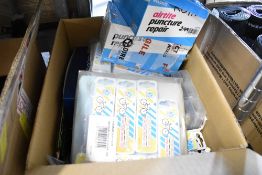 A box of puncture repair kits