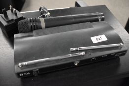 A TOA true diversity radio microphone system, compsrising WT-3810 receiver and WM-3220 microphone