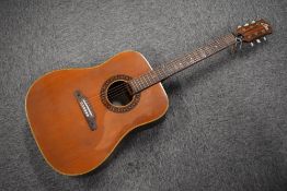 An Eko acoustic guitar, model J54, serial number to bolt on neck, 334350