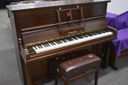 An early 20th Century Challen upright piano having overstrung cast iron frame, including Royal