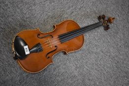 A traditional violin having two piece 13inch back, labelled Joannes Baptist Havelar, Fecit Wien Anno