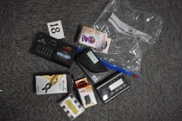 A selection of guitar tuners, pitch pipes etc