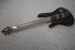 A Washburn Bantam bass guitar (left handed)
