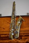 A traditional tenor saxophone , by Corton, sold with fitted case and stand
