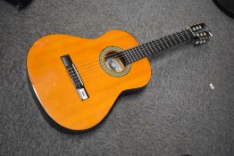 A Tanglewood classical guitar, Discovery DBT34, serial number AL150200512 (3/4 size) , with carry