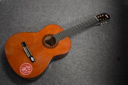 A Valencia CG-160 classical guitar, with branded bag