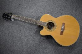An Adam Black left handed electro acoustic guitar