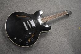 A Jim Pearce archtop electric guitatr , in the Gibson 335 style