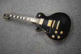 A vintage Gould 'Les Paul' style left handed electric guitar