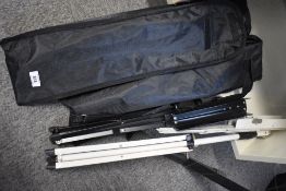 Four music stands (three having zip bags)