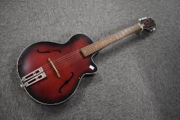 A vintage Egmond (made in Holland) archtop acoustic guitar