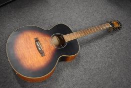 A Shine (made in China) electro acoustic guitar, fitted with passive pick up