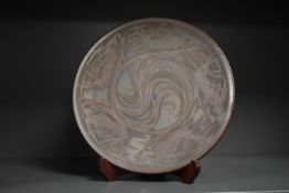 A fine Victorian Burmantofts Faience of Leeds lustre decorative plate after Joseph Walmsley,