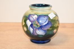 A 20th-century Moorcroft Pottery 'Clematis' vase, of ovoid form featuring tube-lined floral