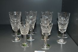 A selection of vintage Irish Waterford crystal 'Alana' port/sherry glasses, featuring a hob nail cut