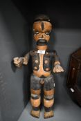 Of ethnographic interest, a Nigerian Ibibio type hand carved standing figure, featuring
