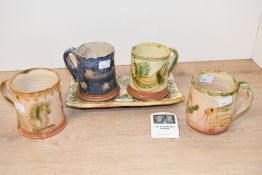 Four sweet vintage Whichford Pottery after Jim and Dominique Keeling mugs, all featuring whimsical