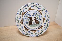A large vintage Bell Pottery platter, featuring sweet leaping hare and bluebell motifs, impressed