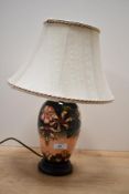 A 20th-century Moorcroft Pottery 'Oberon' table lamp designed by Rachel Bishop, featuring tube-lined