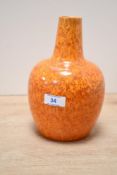 A fine early to mid 20th-century Royal Lancastrian pottery vase, featuring a vibrant orange and