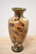 An early 20th-century Royal Doulton Lambeth stoneware 'Autumn Foliage' vase, featuring the