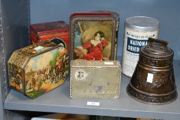 A quantity of 20th-century advertising tins, to feature a Huntley and Palmer's bell-shaped biscuit