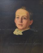 J.W.Lee (British 19th Century) Oil on canvas, a portrait of a young woman dressed in dark period