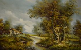 A 20th Century oil on canvas landscape, depicting a rural riverside cottage in Autumn, signed