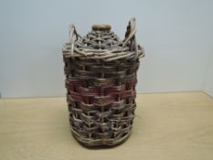 Navy Rum, stoneware flagon believed to contain Navy Rum, sealed in wicket basket, 1 litre+, wax seal