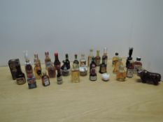 A selection of vintage whisky and other alcoholic miniatures, to include Bowmore Islay single malt