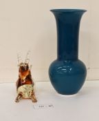 A Murano blue glass vase of bulbous form with a flared neck  bears a mark to the base  10.5"h; and a