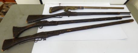 Four prop guns: to include one fashioned as a Matchlock rifle  53"L
