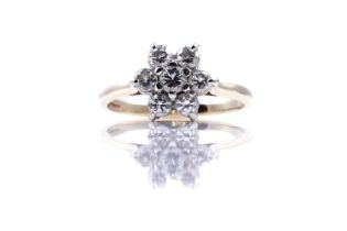 A 20th Century diamond flowerhead pattern ring