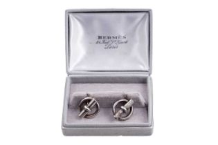 A pair of Hermès silver cufflinks