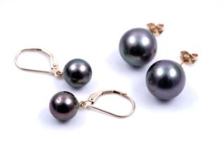 Two pairs of cultured black pearl earrings