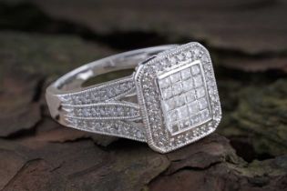 A contemporary pavé set diamond ring
