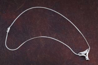 A contemporary diamond pendant necklace
