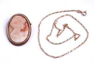 A 9ct gold fancy link necklace; and a cameo brooch set in 9ct gold