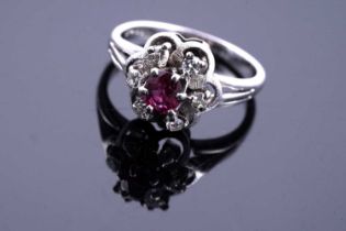 A mid-20th Century ruby and diamond flowerhead pattern ring
