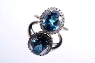 A contemporary London blue topaz and diamond ring