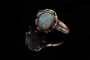 A contemporary opal doublet ring