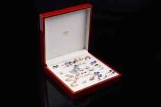 A collection of contemporary gemstone set earrings