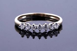 A contemporary diamond half hoop eternity ring