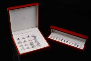 A collection of contemporary gemstone set rings and earrings