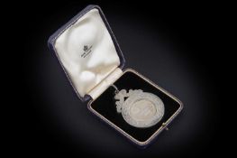 A Victorian Scottish silver school prize medal