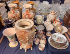 A Japanese satsuma vase and stand together with a pair of Japanese satsuma vase,