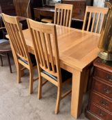 A 20th century oak extending dining table, 132cm long x 90cm wide x 77cm high,