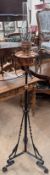 A Victorian copper and cast iron standard oil lamp